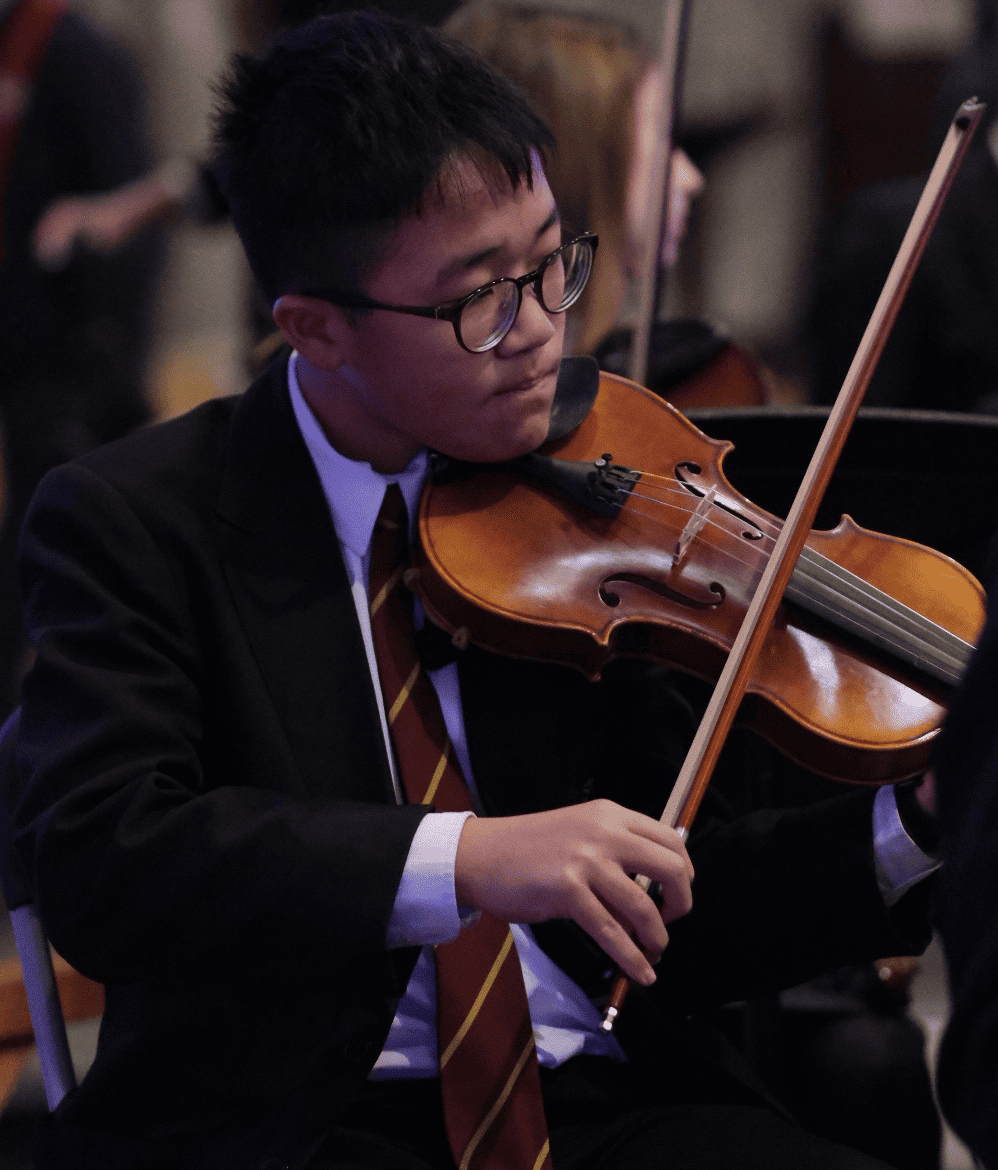 Pupil playing the violin