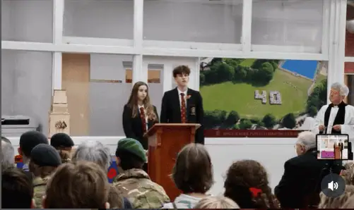 Young students presenting at Kings School event in Hants.