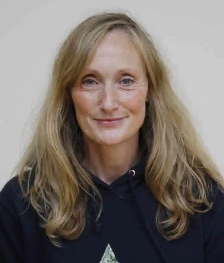 Portrait of a friendly female staff member at Kings School, showcasing professional and approachable staff for prospective students and parents.