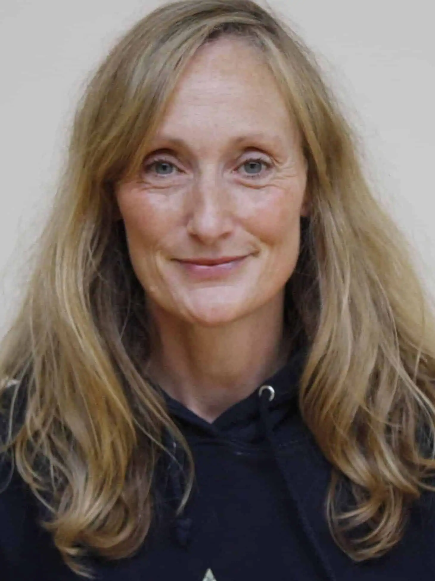Portrait of a friendly female staff member at Kings School, showcasing professional and approachable staff for prospective students and parents.